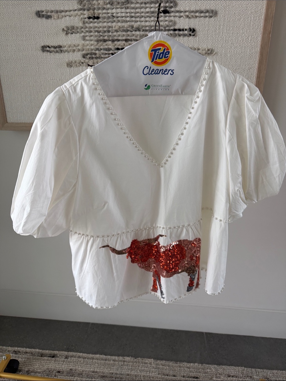 Queen of Sparkles Women’s White Sequin Longhorn Peplum Top with Pearl Trim